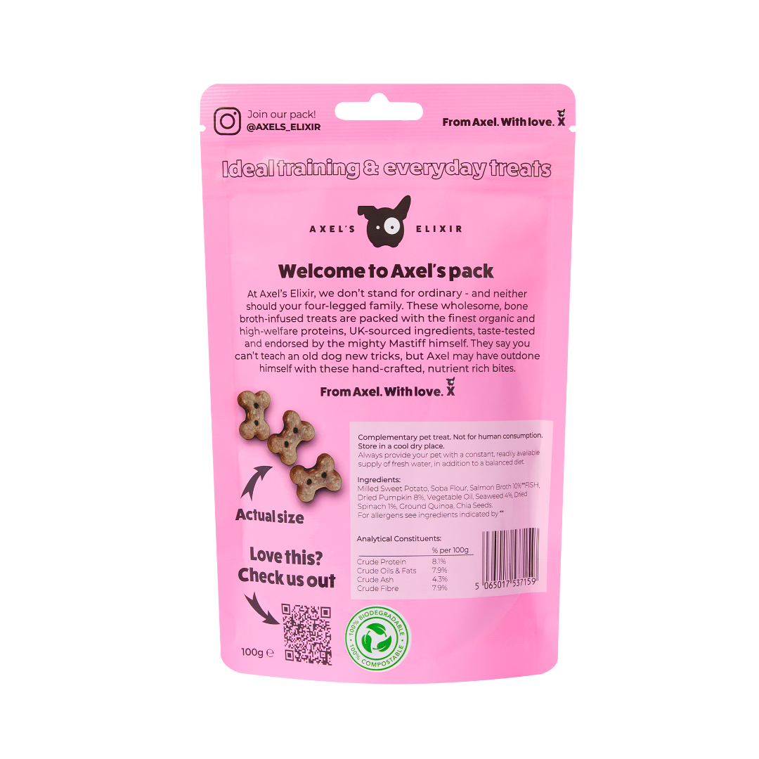 Pink packaging of Axel's Elixir dog treats with text and QR code on a white background